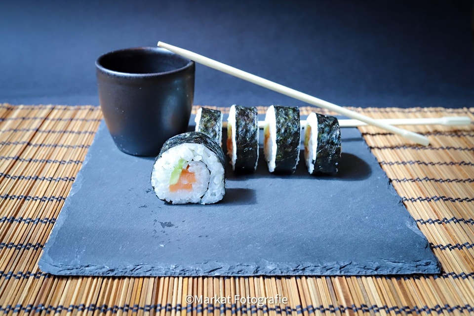 Sushi salmon rolls with avocado and Friesblond Oud
